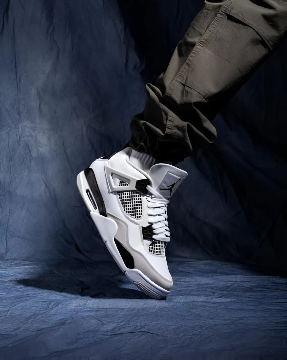 "Nike Air Jordan Retro 4 Military Black – Iconic Style, Supreme Comfort!"